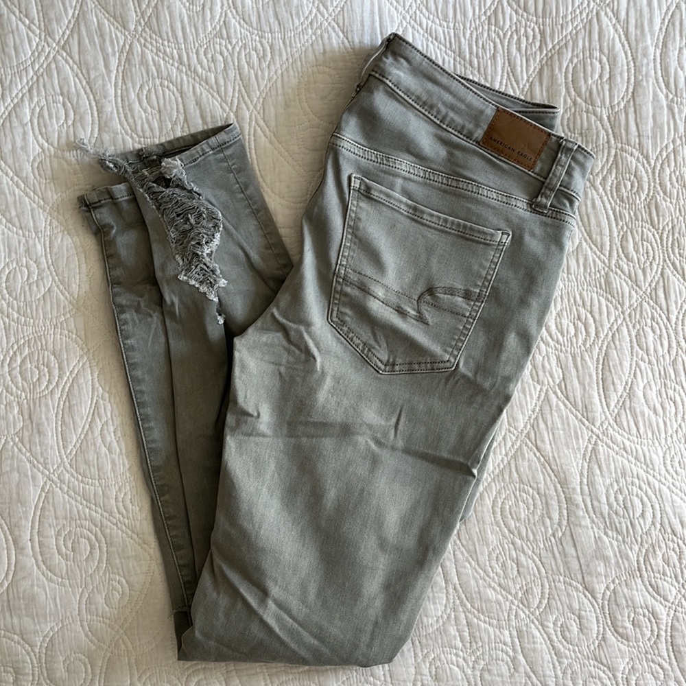 American Eagle Green shredded sage green skinny jeans